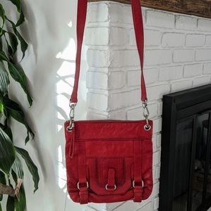 The Sak red leather cross body bag